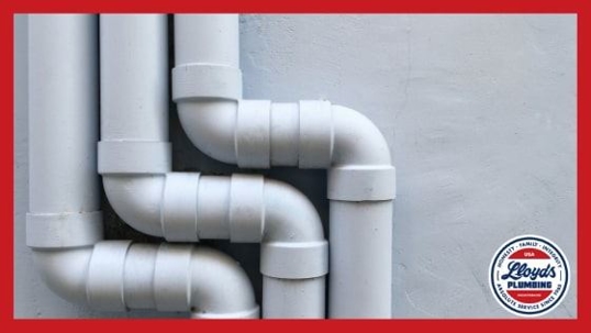 Three white pipes next to one another