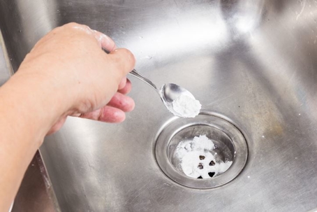 putting baking soda down the drain